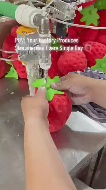 Real squeeze demonstration of Jumbo Red Strawberry Squishy Fidget Toy