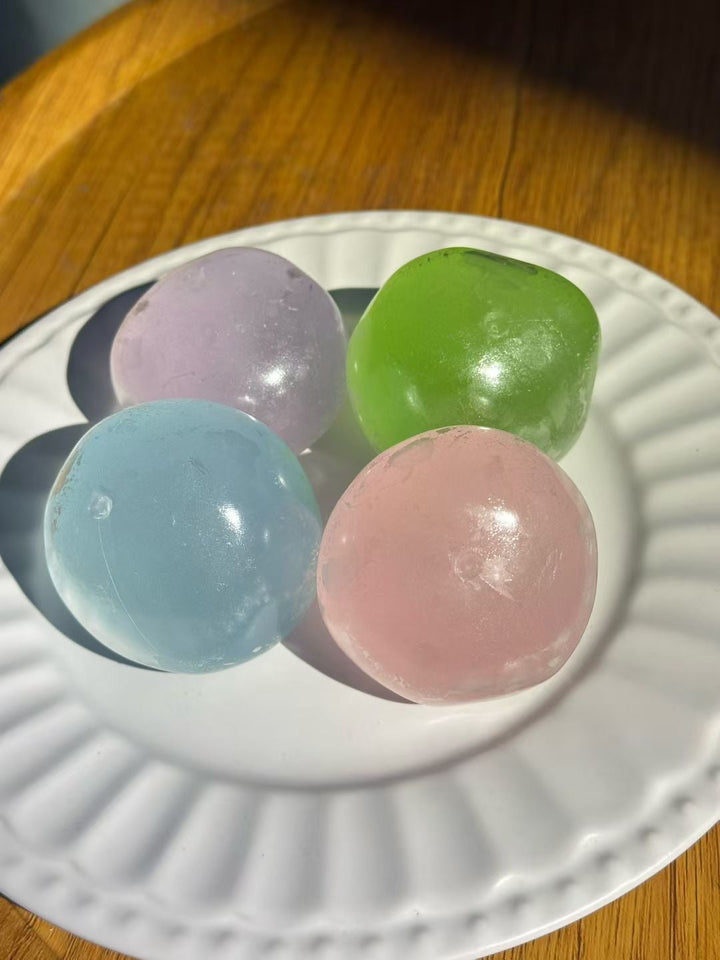Random-color coconut oil stress ball squishy before pressing